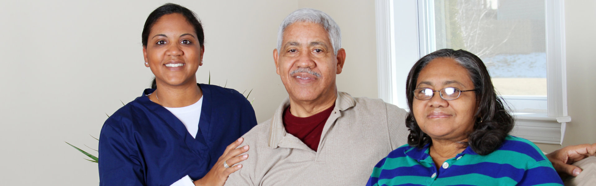 lady sitting with elderly couple